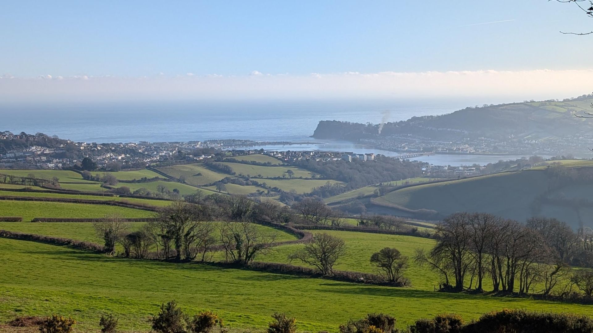 View over fields to Bishopsteignton and the Teign Estuary